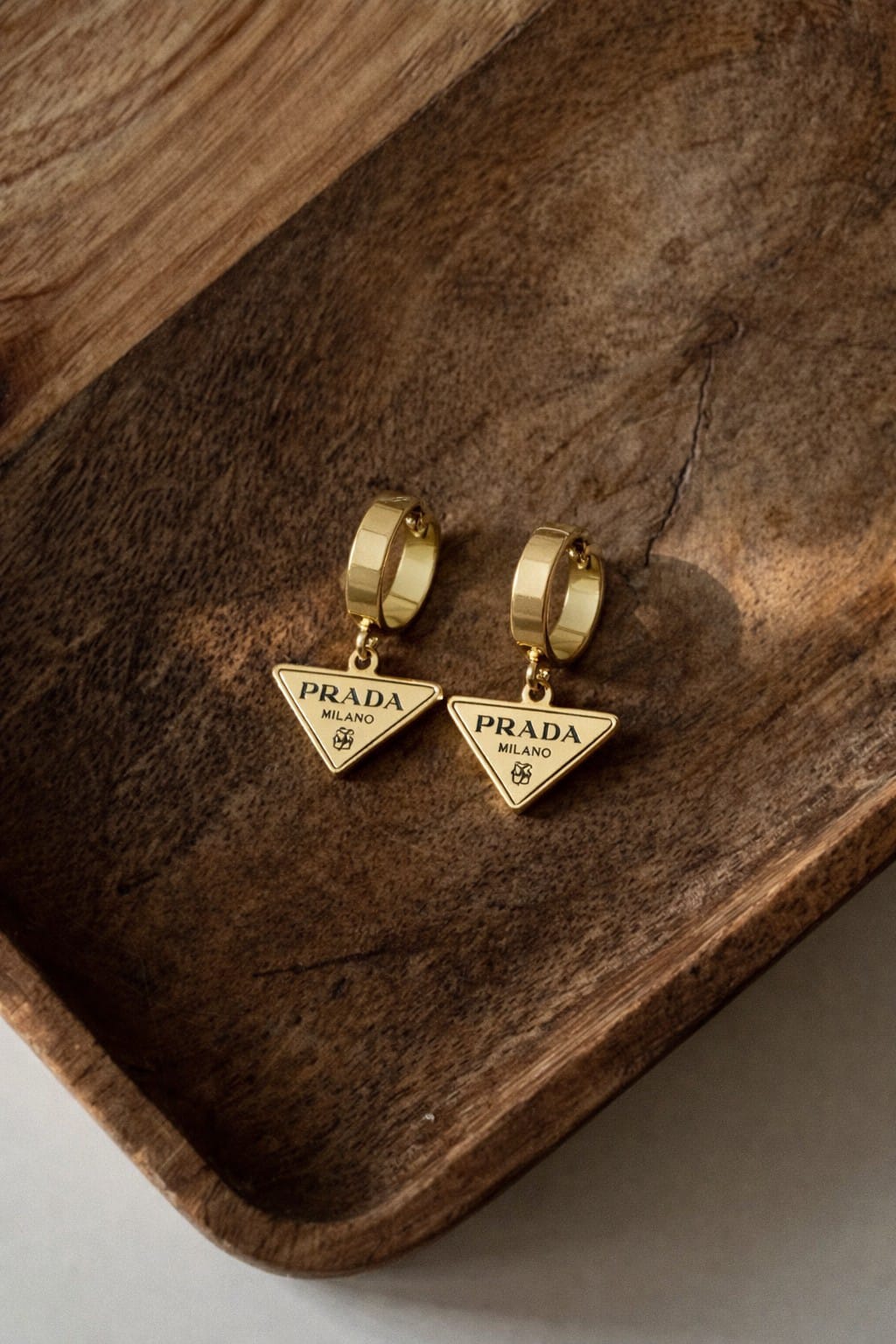 Gold Prada Emblem