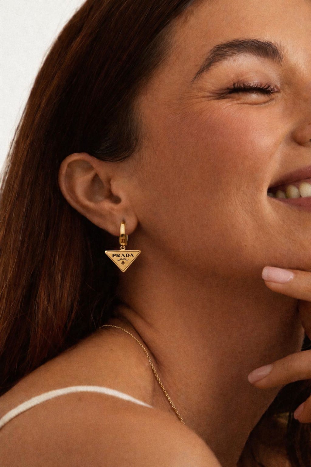 Gold Prada Emblem